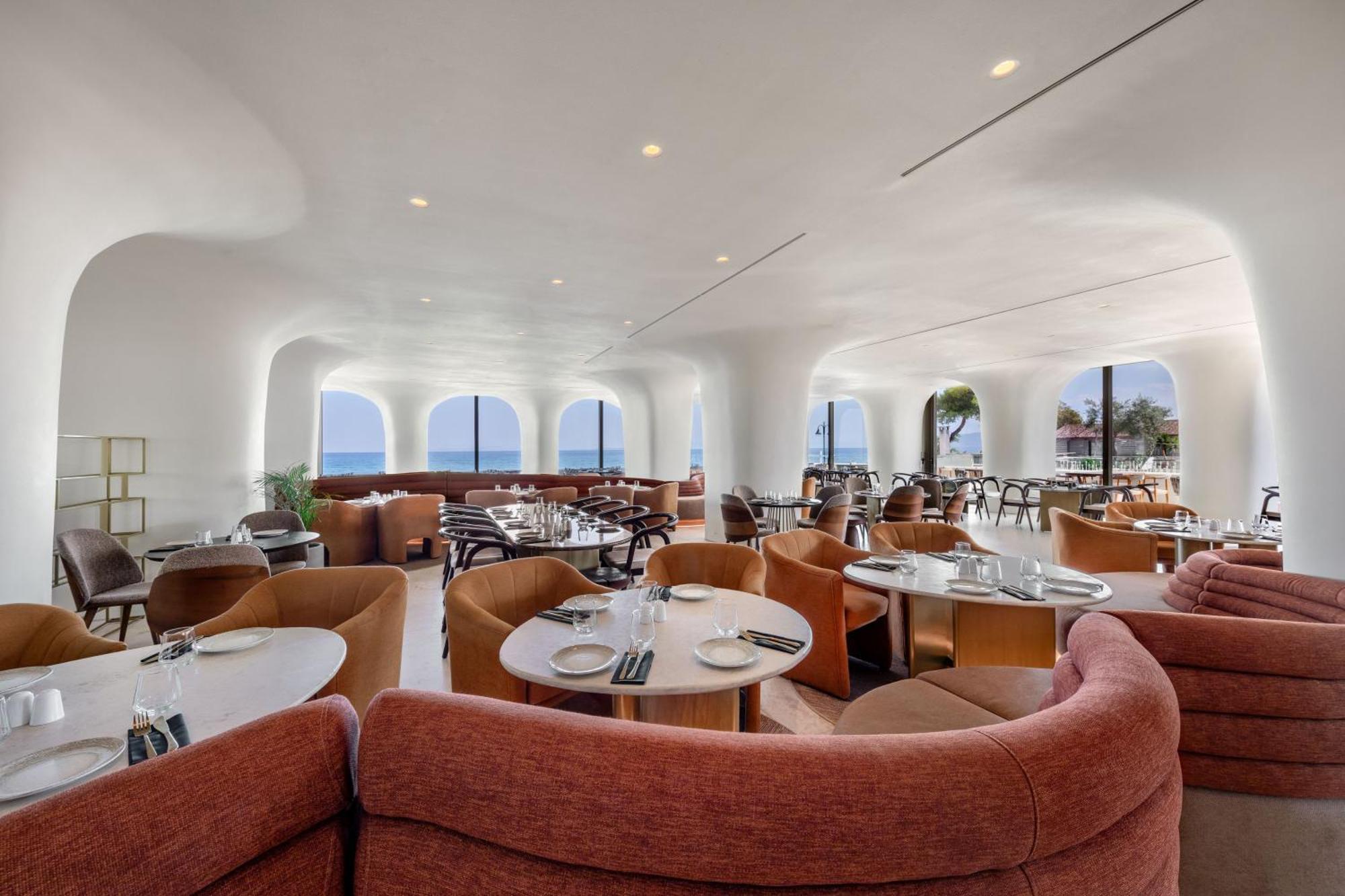 Isla Brown Corinthia Resort & Spa, Curio Collection By Hilton Agii Theodori Exterior foto The interior of the restaurant