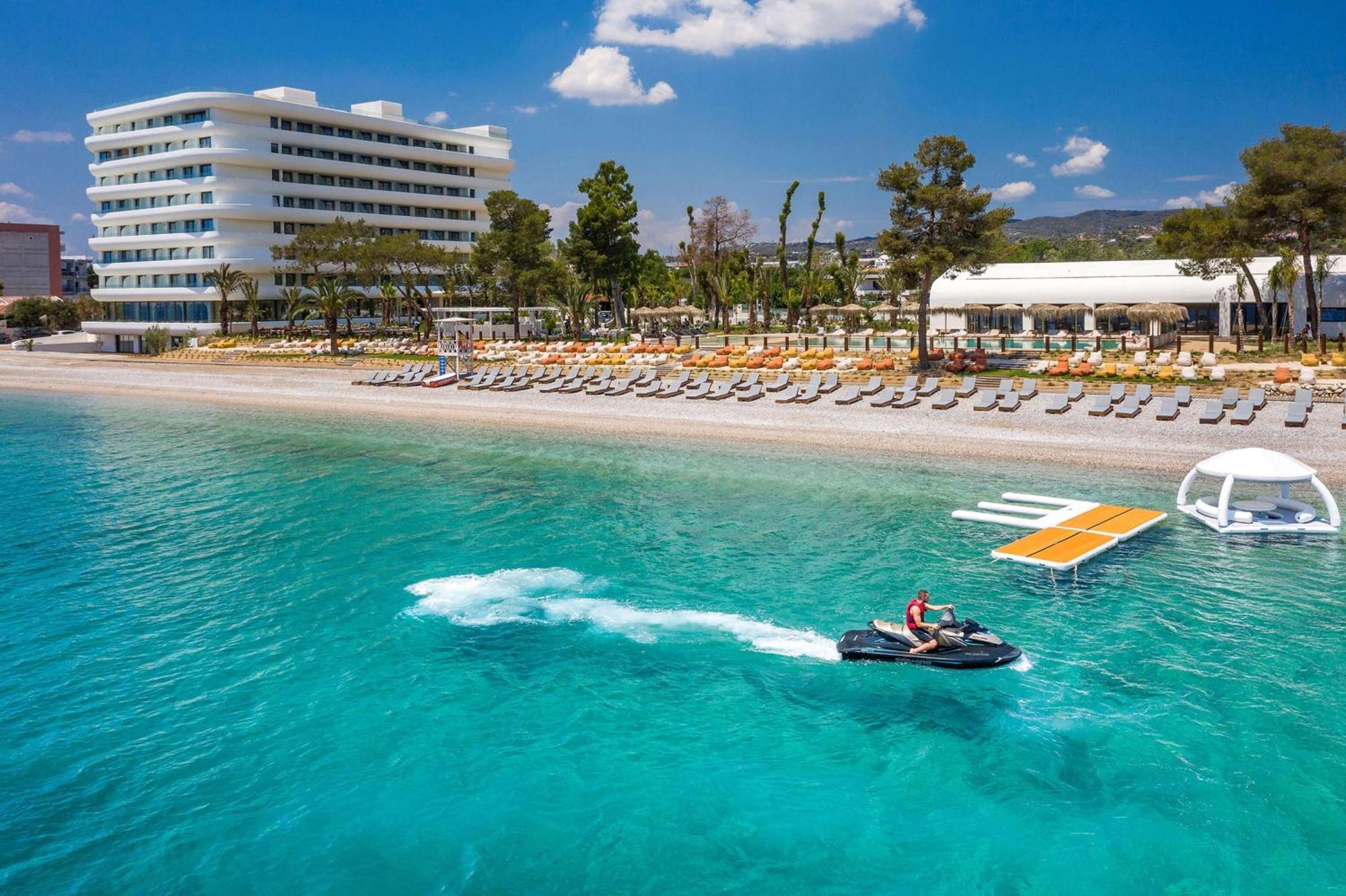 Isla Brown Corinthia Resort & Spa, Curio Collection By Hilton Agii Theodori Exterior foto The resort's beach