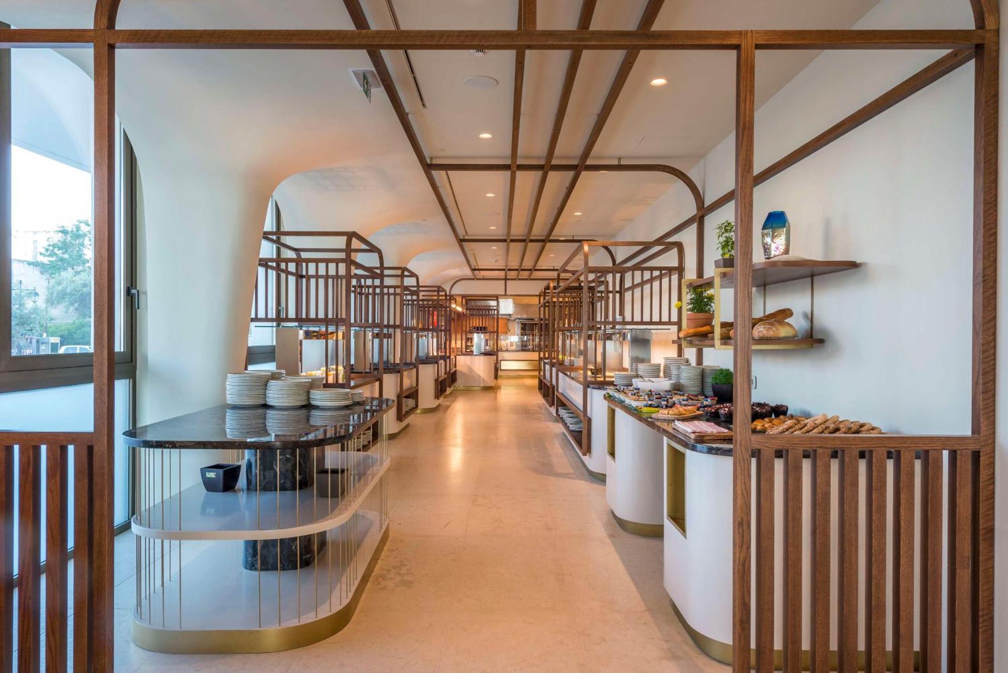 Isla Brown Corinthia Resort & Spa, Curio Collection By Hilton Agii Theodori Exterior foto The interior of the lounge
